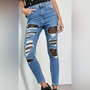 Topshop moto Jamie destroyed denim fishnet jeans